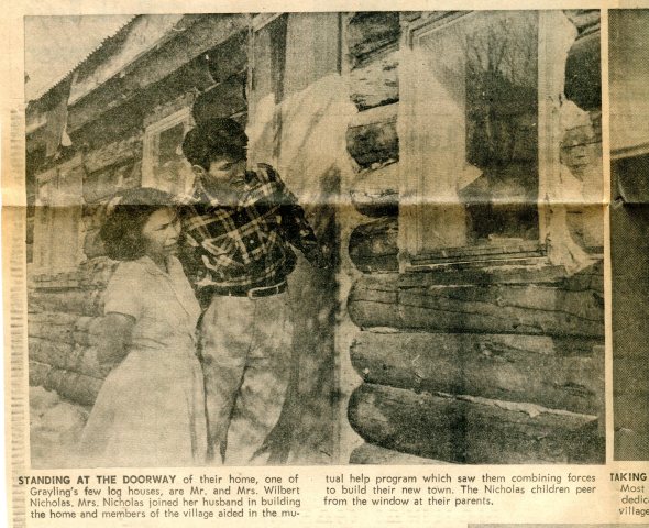 Couple enters one of the new houses dedicated by Elfriede on April 4, 1966. (Anchorage Daily News)
